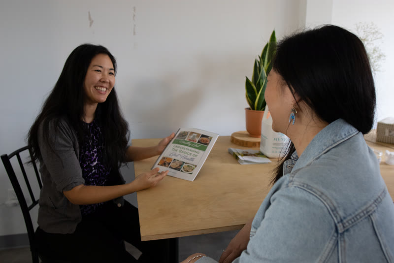 Two women talking during a consultation