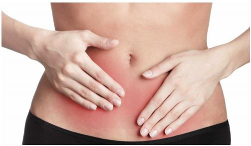 hands on slightly red and inflamed tummy, indicating soothing the belly and having gut health issues.